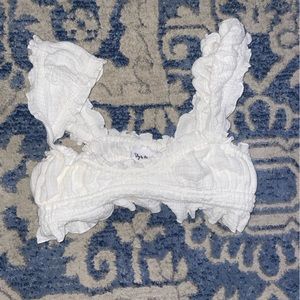 Dainty white top. So cute. Isabelle’s cabinet